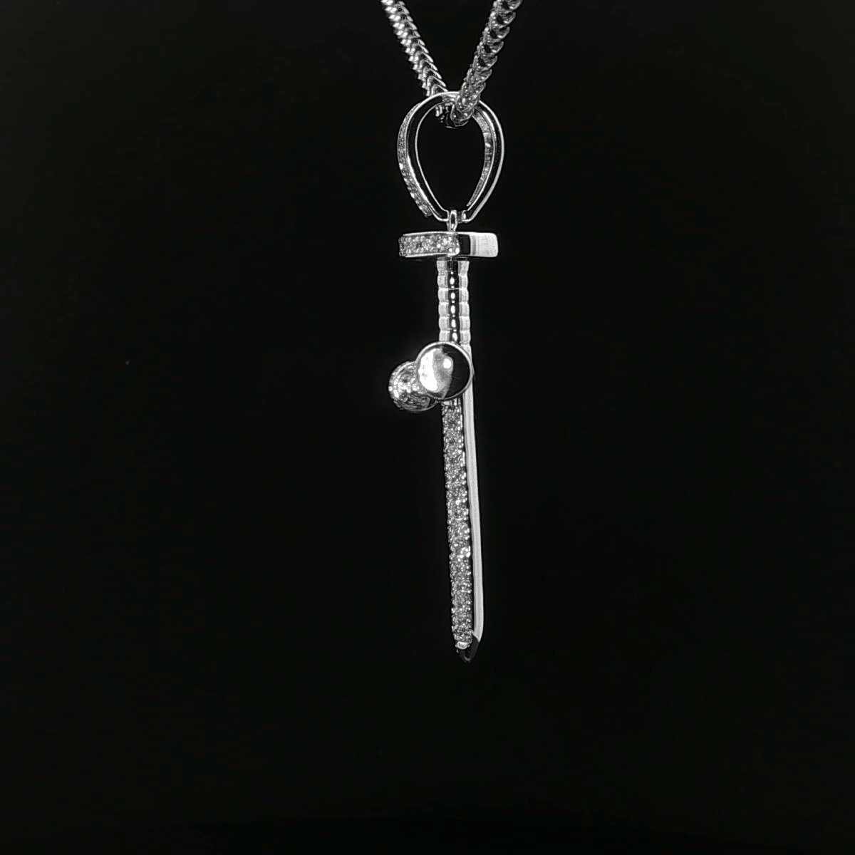 CRUZ DE ORO BLANCO CON DIAMANTES